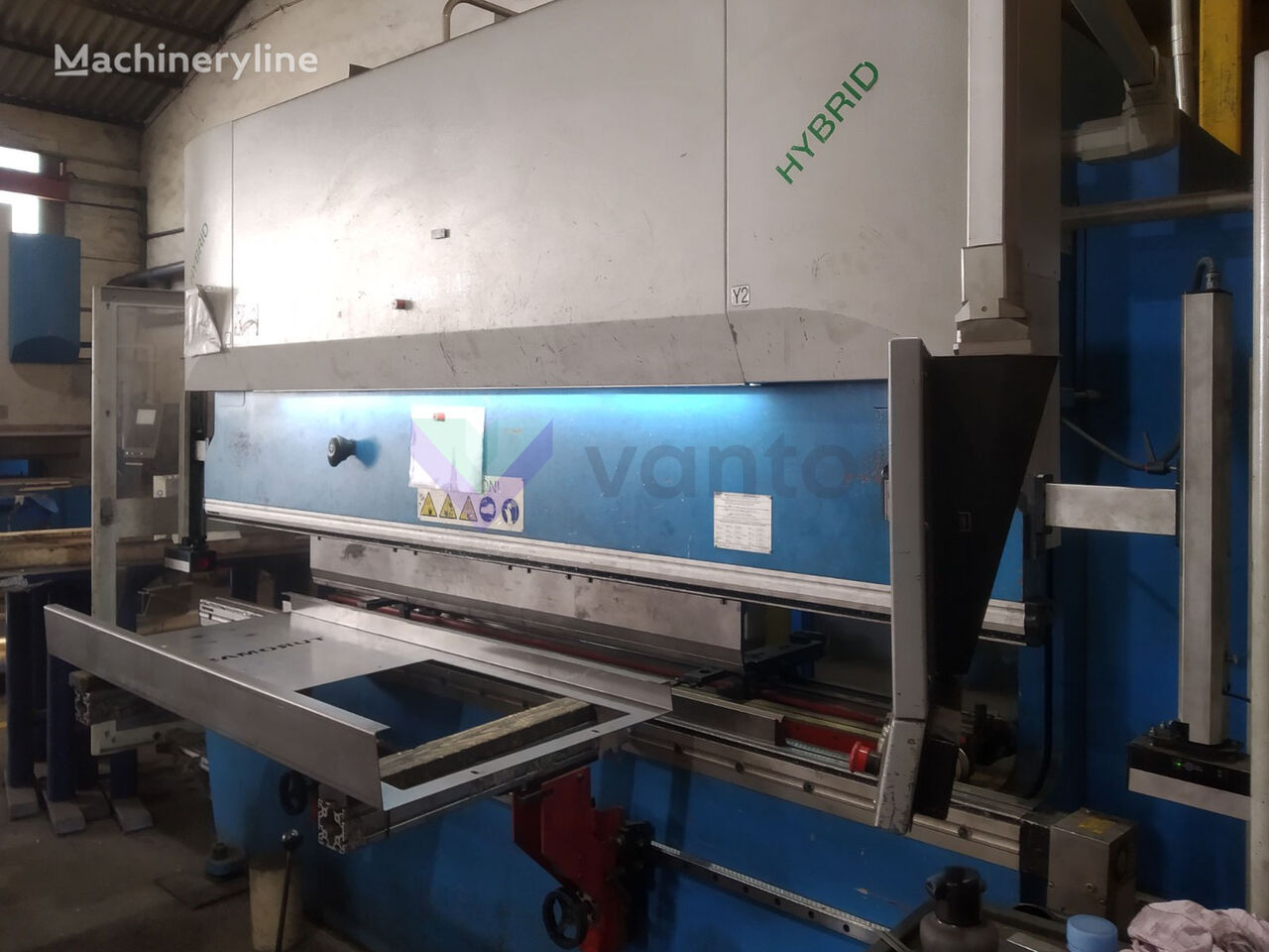 Axial sheet bending machine