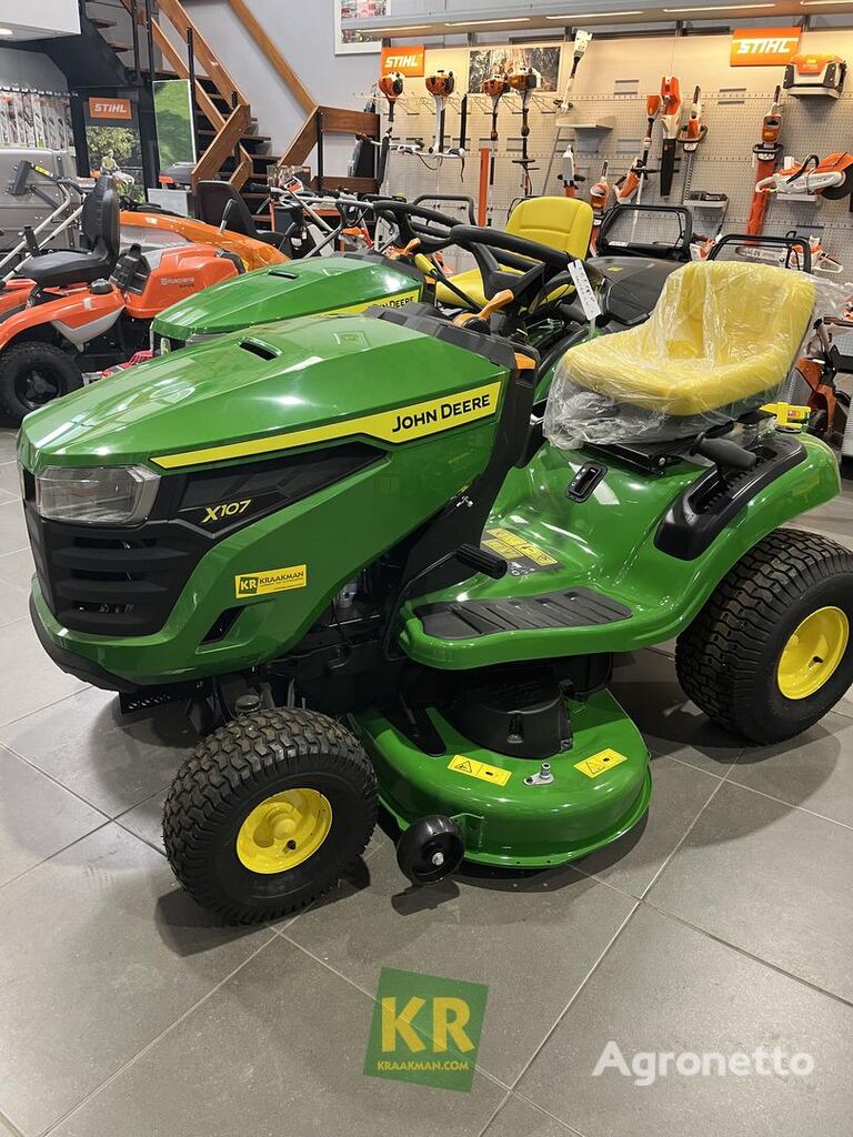 новый трактор газонокосилка John Deere X107