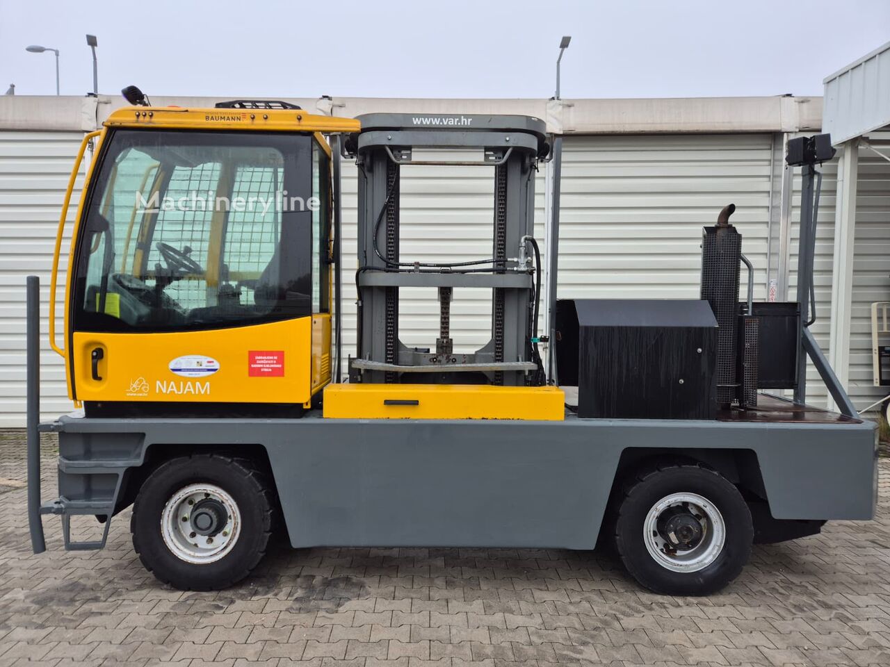 رافعة شوكية / شحن جانبي Baumann GX 40/12/57 TR - Machineryline