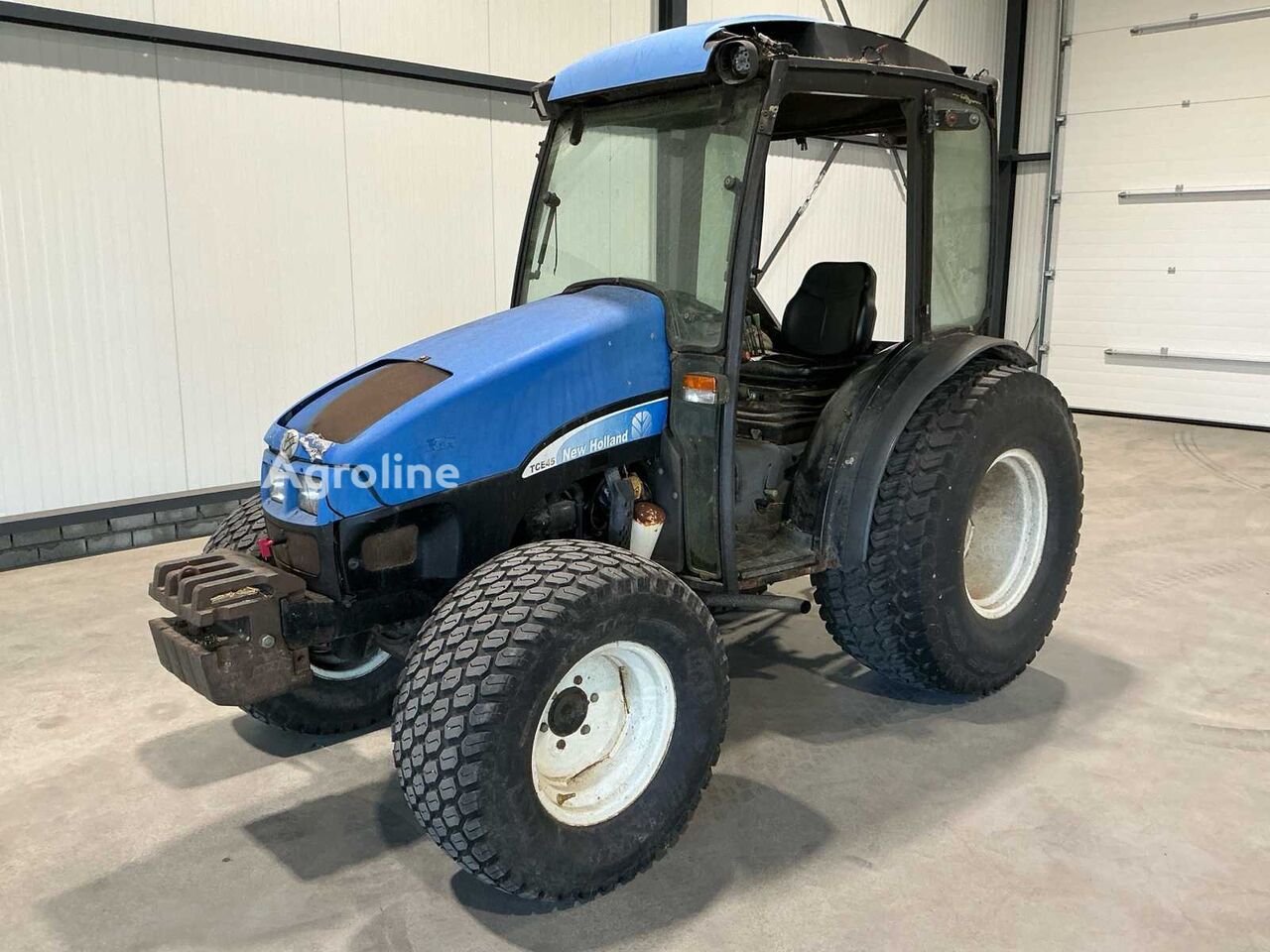 Минитрактор New Holland TCE45 - Agroline