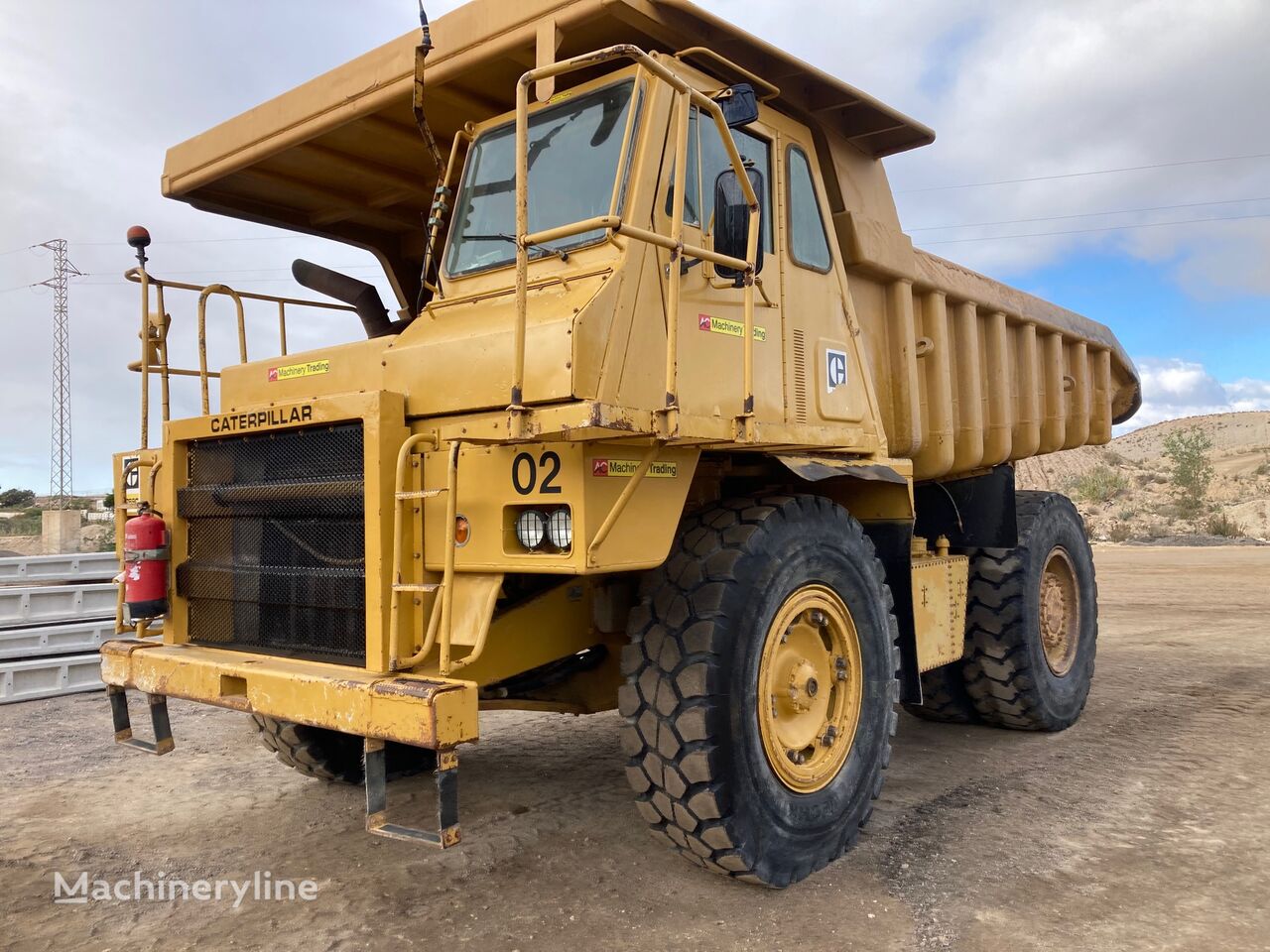 карьерный самосвал Caterpillar 769C