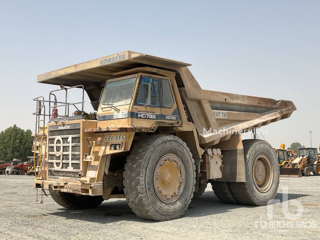 Prodaja Komatsu HD785-3 dampera sa krutom šasijom | Machineryline BA Komatsu HD785-3 damper sa krutom šasijom - Machineryline