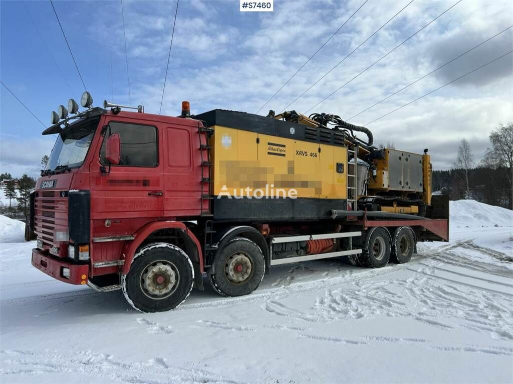 Scania R143 HL 8x2 59 with Atlas Copco XRVS466 compressor ambulancia