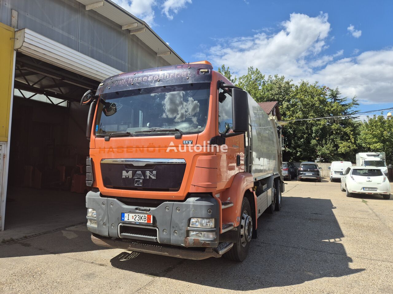 camion poubelle MAN TGS 26.440