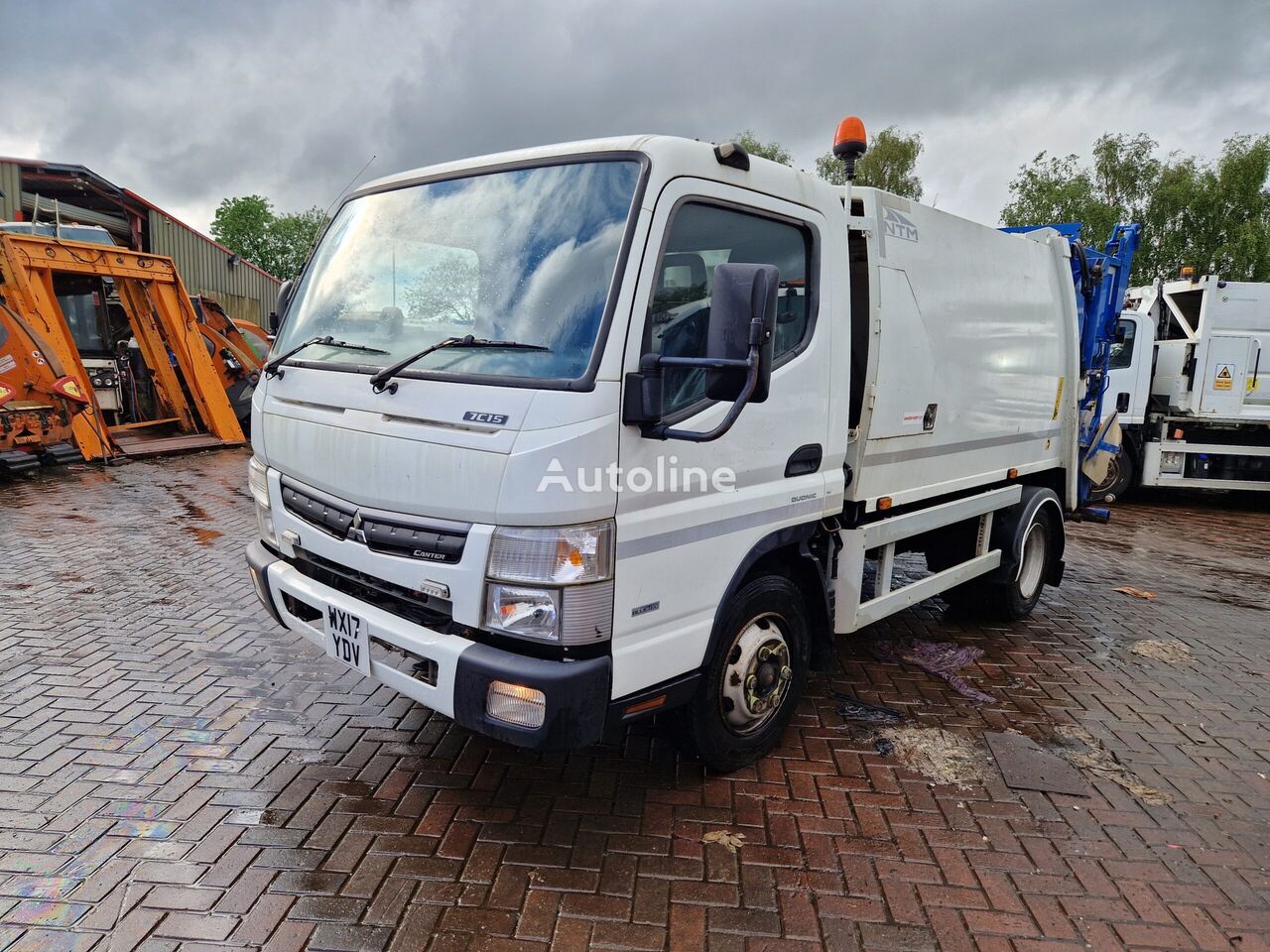 Mitsubishi Canter garbage truck