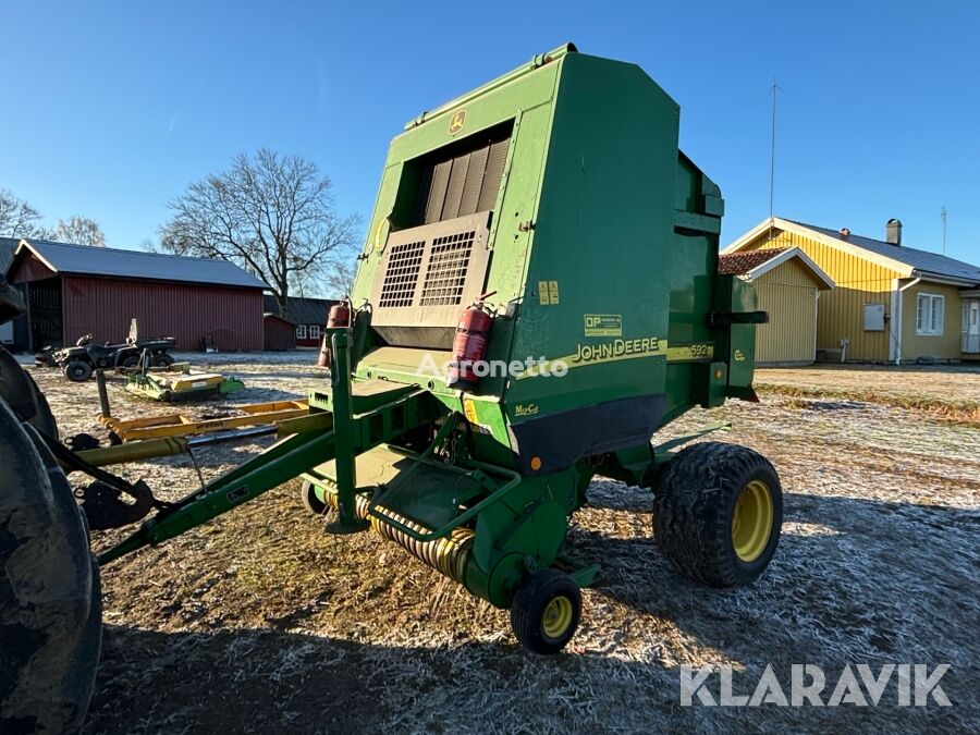 presse à balles rondes John Deere 592/NB