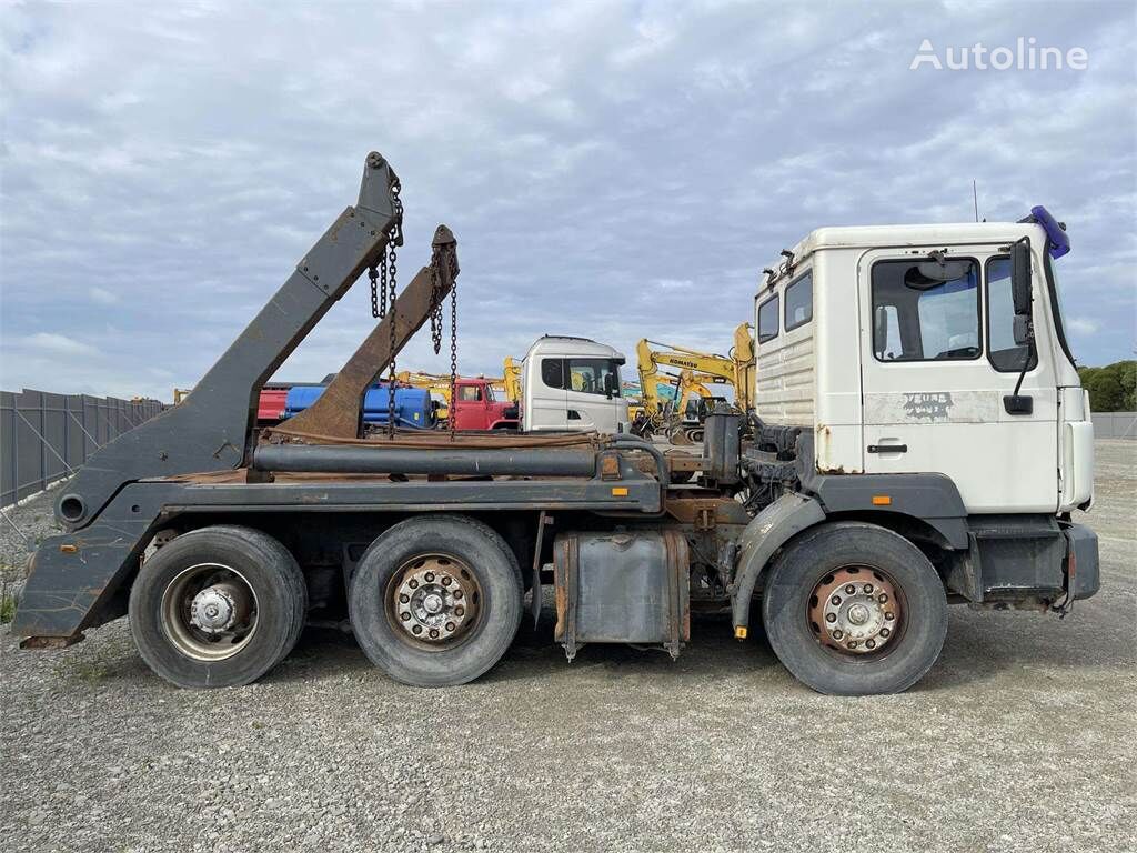 MAN 26.343 skip loader truck