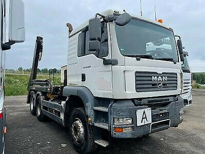 MAN TGX 26.440  skip loader truck