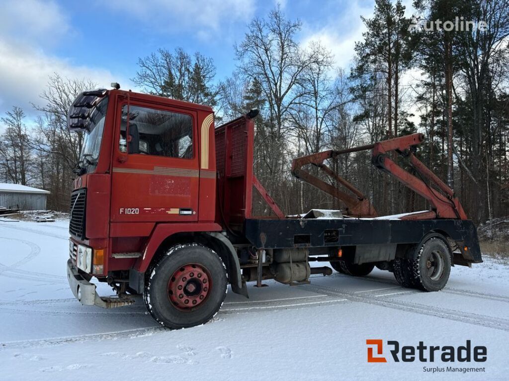 Volvo F10 skip loader truck