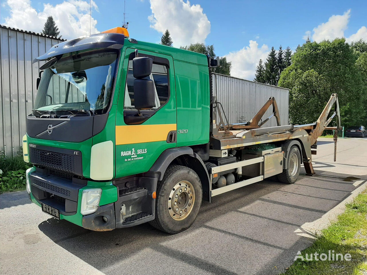 Volvo FE 320 skip loader truck