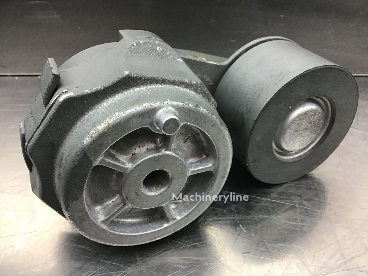 Liebherr belt tensioner for construction equipment