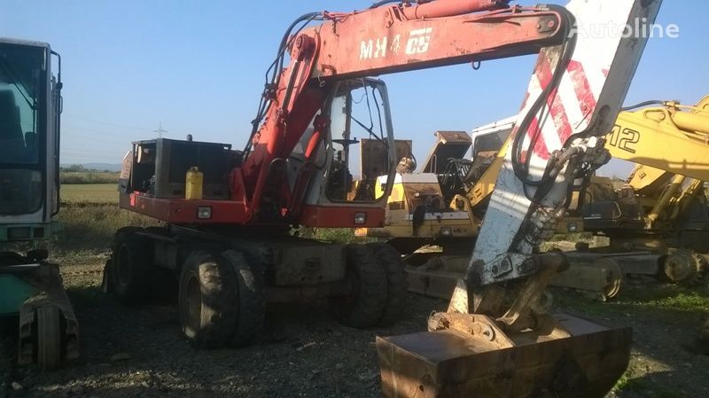 Cabină pentru excavator O&K MH4 - Machineryline