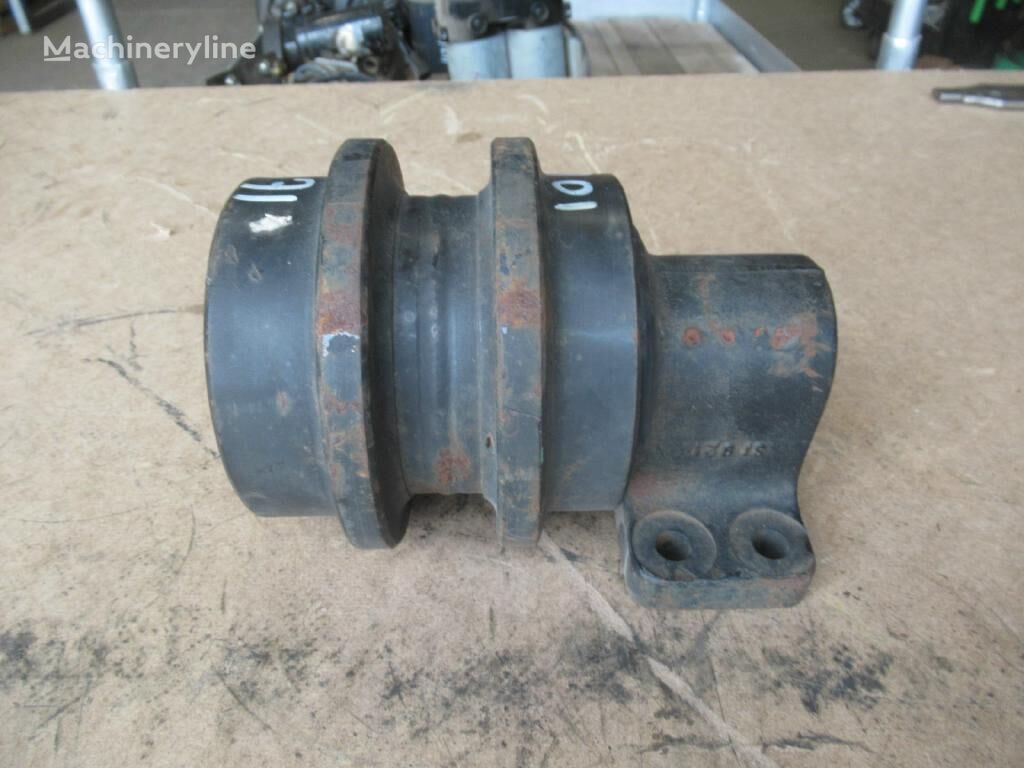 Carrier roller Fiat-Hitachi 71460901 71460901 untuk excavator C60 C90 C90R EX135 - Machineryline