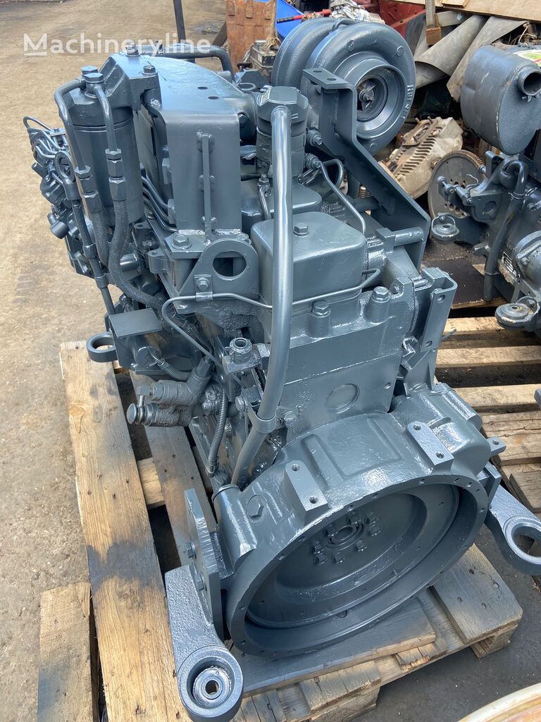 motor Komatsu SA6D102E para retroescavadora