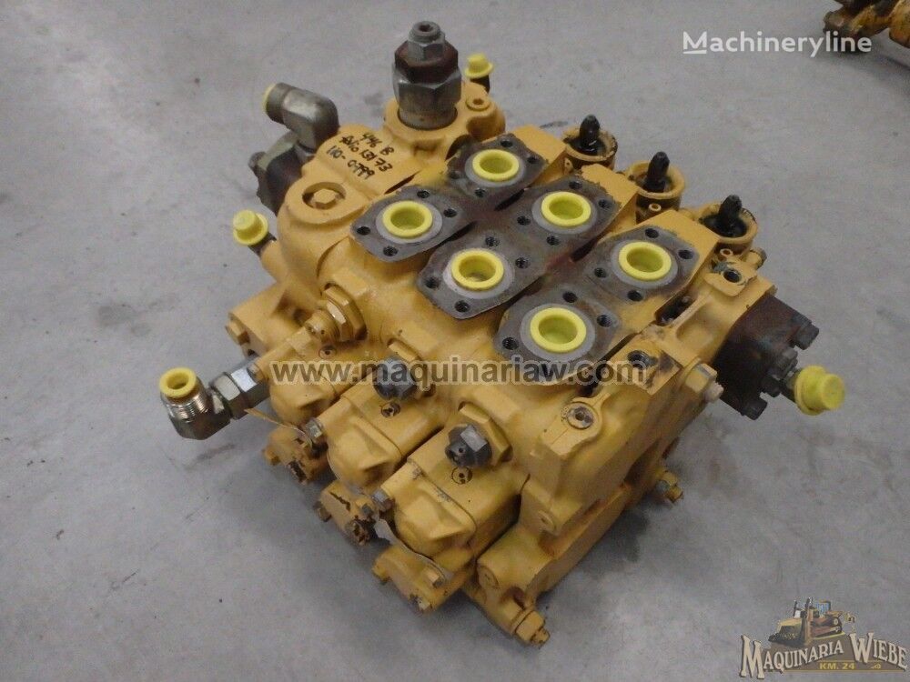 Caterpillar 110-0799 hydraulic distributor for Caterpillar 446B backhoe loader