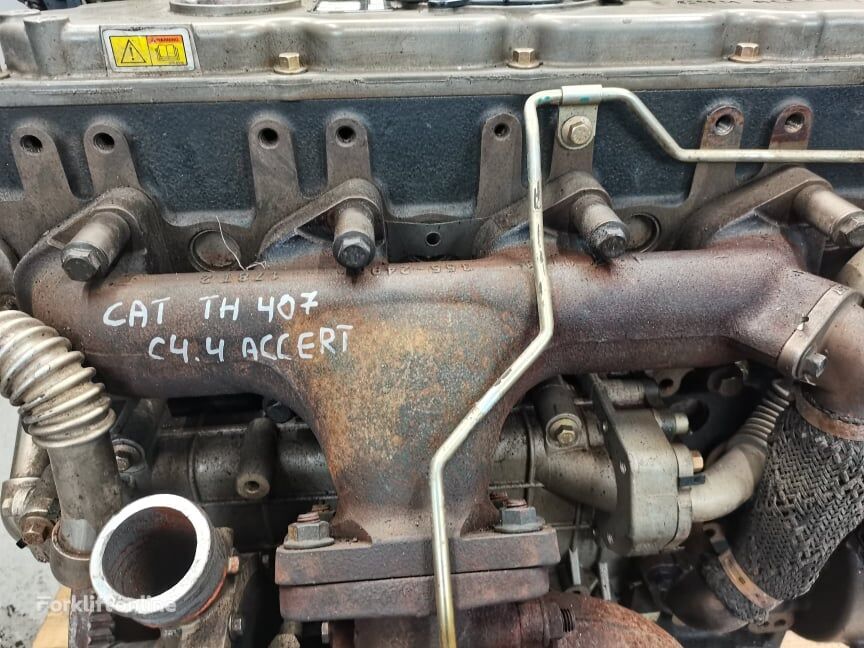 CAT TH 406 { wydechowy CAT C4.4 Accert} manifold for telehandler