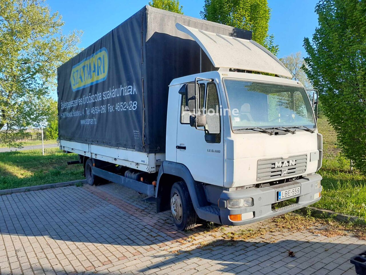MAN L2000 tarpaulin truck - Autoline