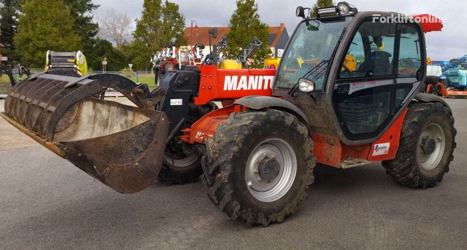 Manitou 735 (mozhlyvyi lizynh) cargadora telescópica - Forkliftonline