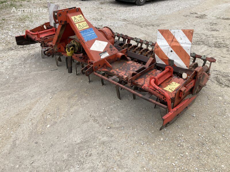 Kuhn HRB 302 D + Güttler Packer Kreiselegge