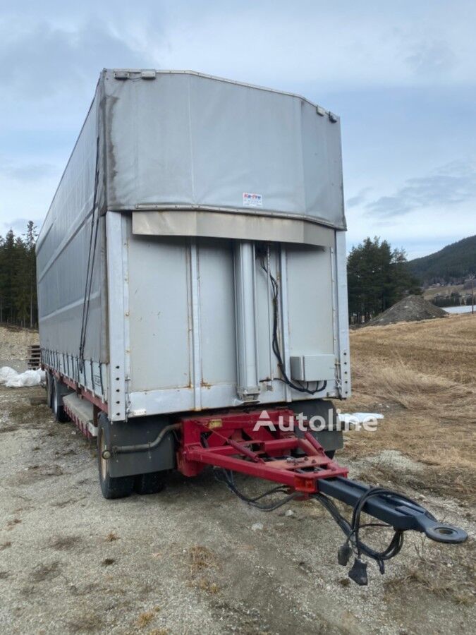 Приколка со церада Tyllis 3-akslet henger med hevbart kapell og bakdører - Autoline