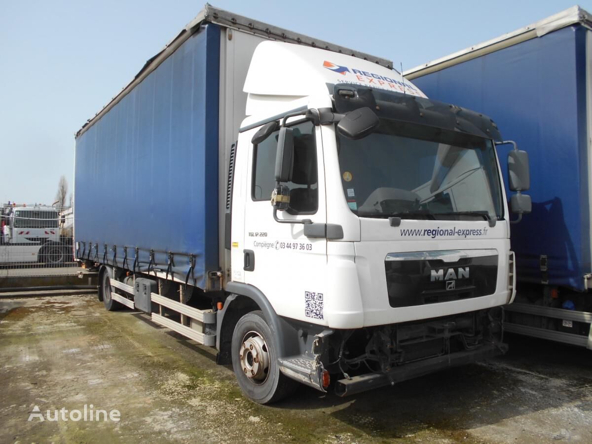 damaged MAN TGL 12.220 tilt truck