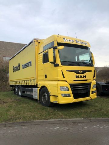 MAN TGX tilt truck