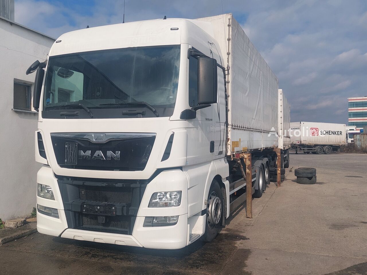 тентованный грузовик MAN TGX 26.460