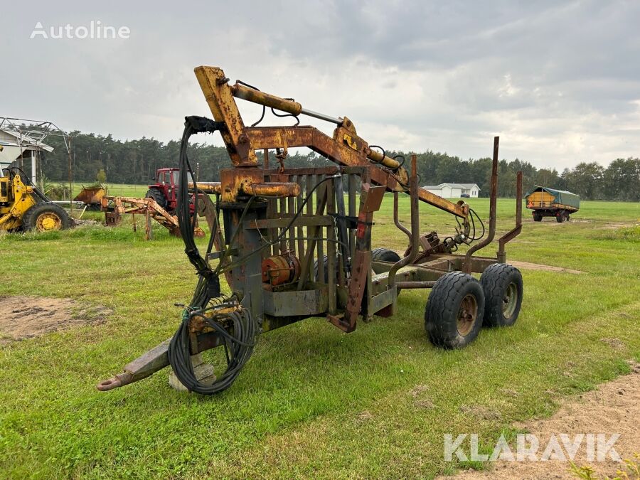 приколка за превоз на дрва Skogsvagn med kran