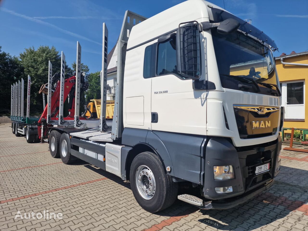 camion forestier MAN MAN TGX 33.500 + remorque forestière