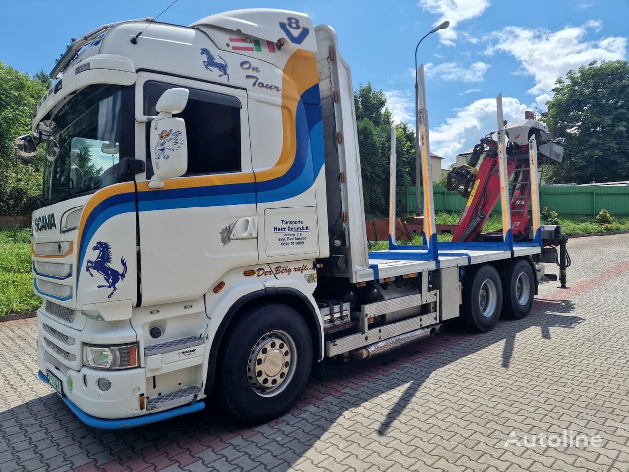 camião de transporte de madeira Scania R 560