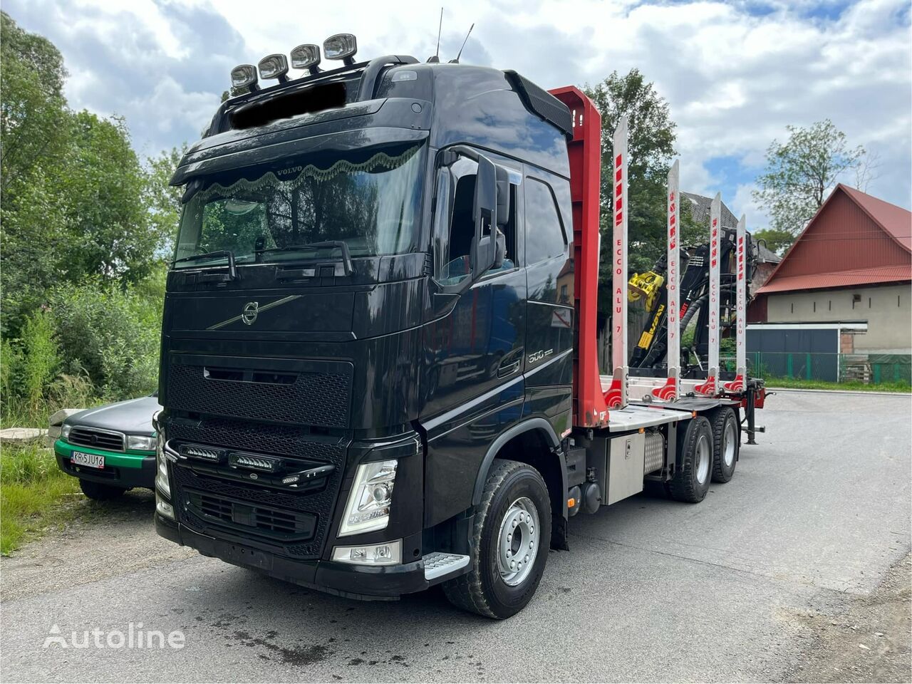 camião de transporte de madeira Volvo FH13 500