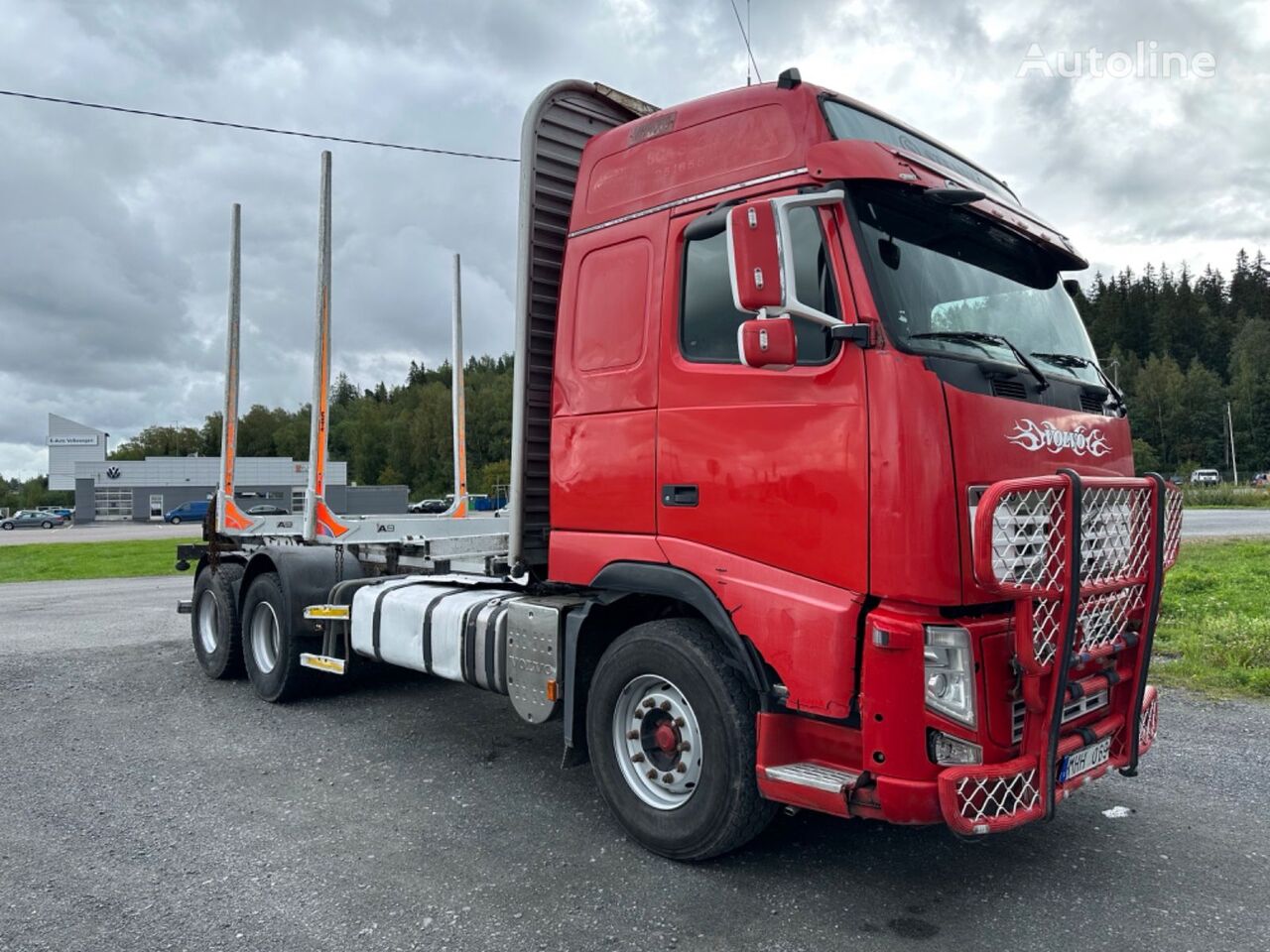 camião de transporte de madeira Volvo FH540 6x4