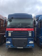 DAF XF 105 460 truck tractor + curtain side semi-trailer