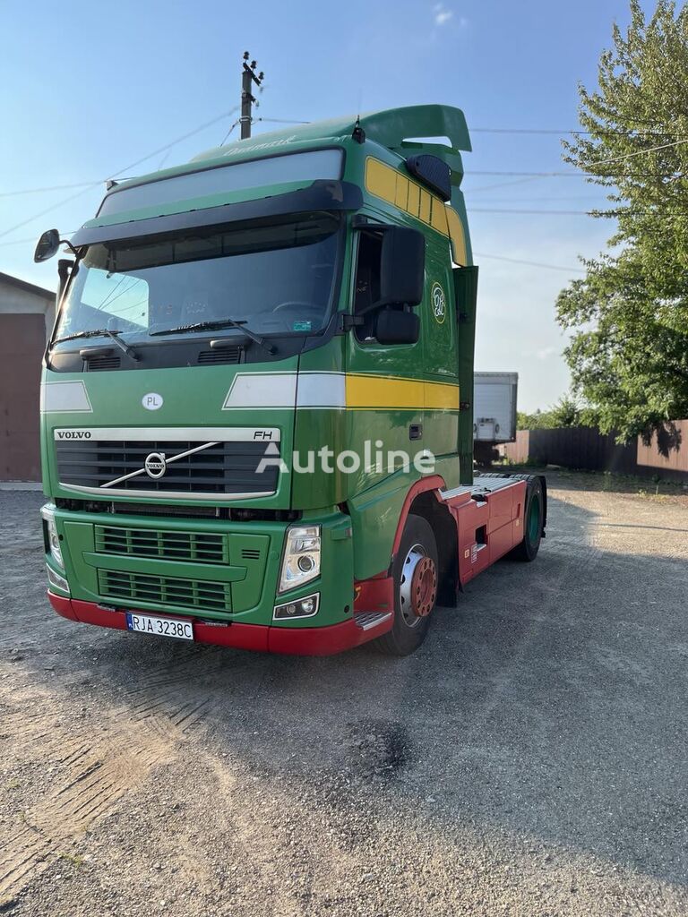 тягач Volvo FH 12.420 + полуприцеп штора