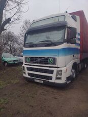 đầu kéo Volvo FH12 460 + sơ mi rơ moóc kiểu lật