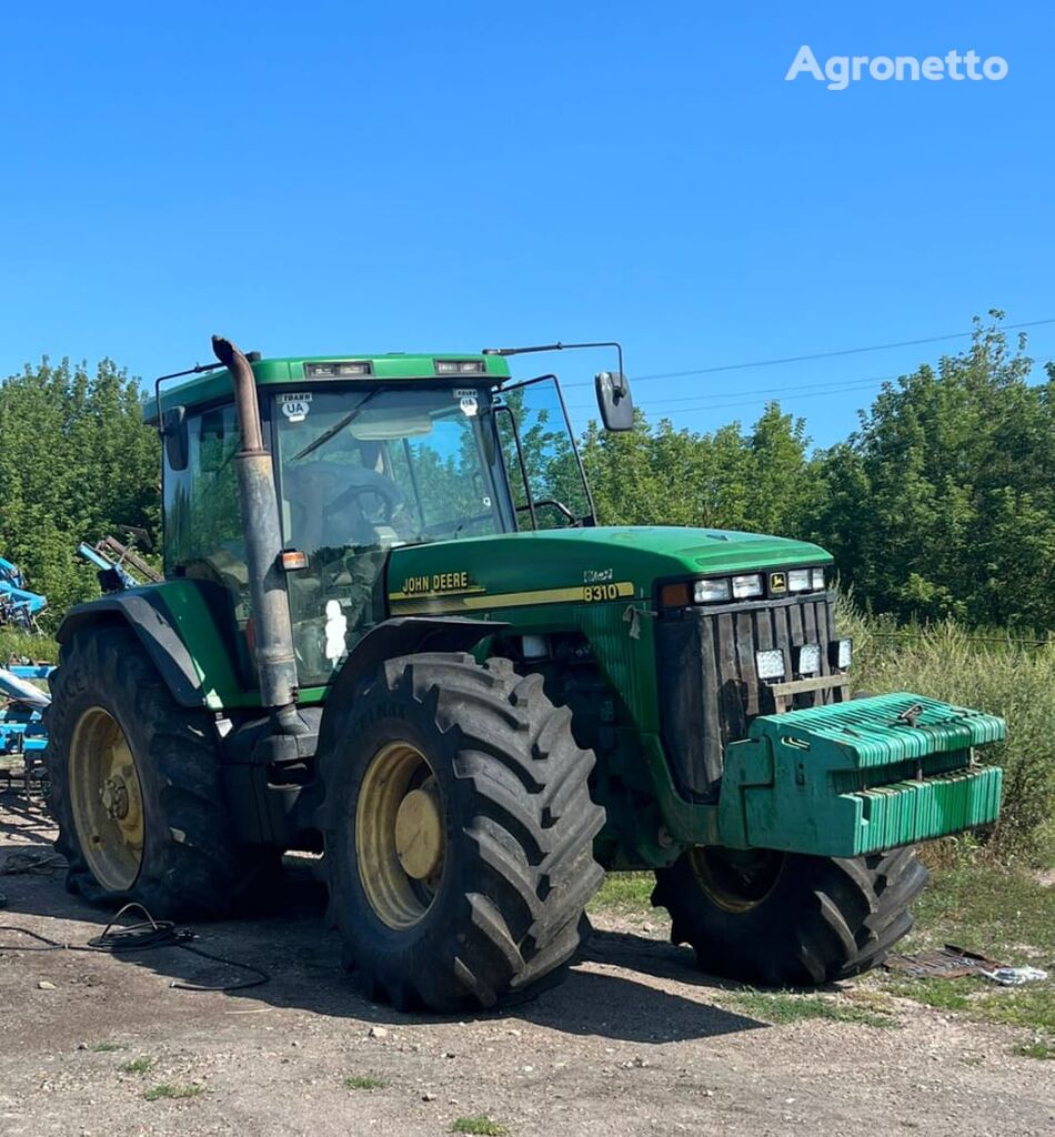 трактор колесный John Deere 8310