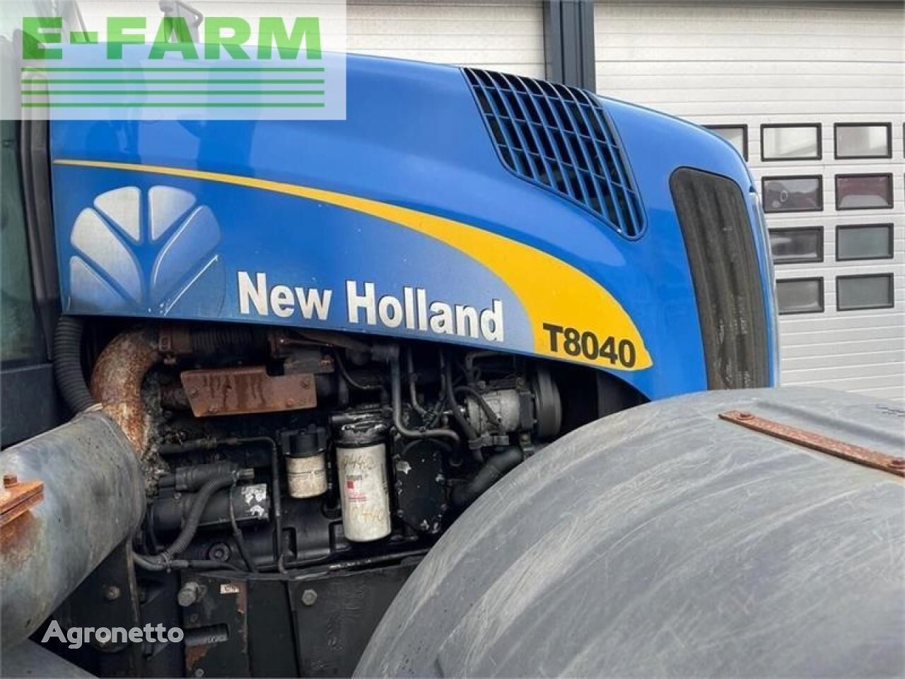 τροχοφόρο τρακτέρ New Holland 8040 affjedret foraksel