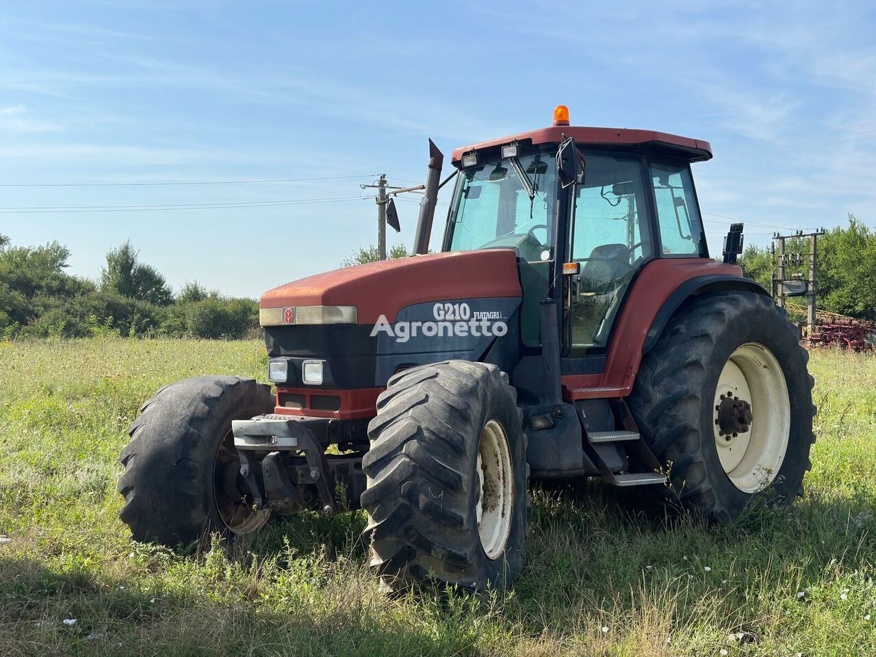 New Holland G210 riteņtraktors