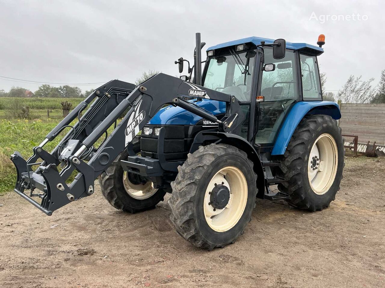 трактор колесный New Holland TS90 SLE